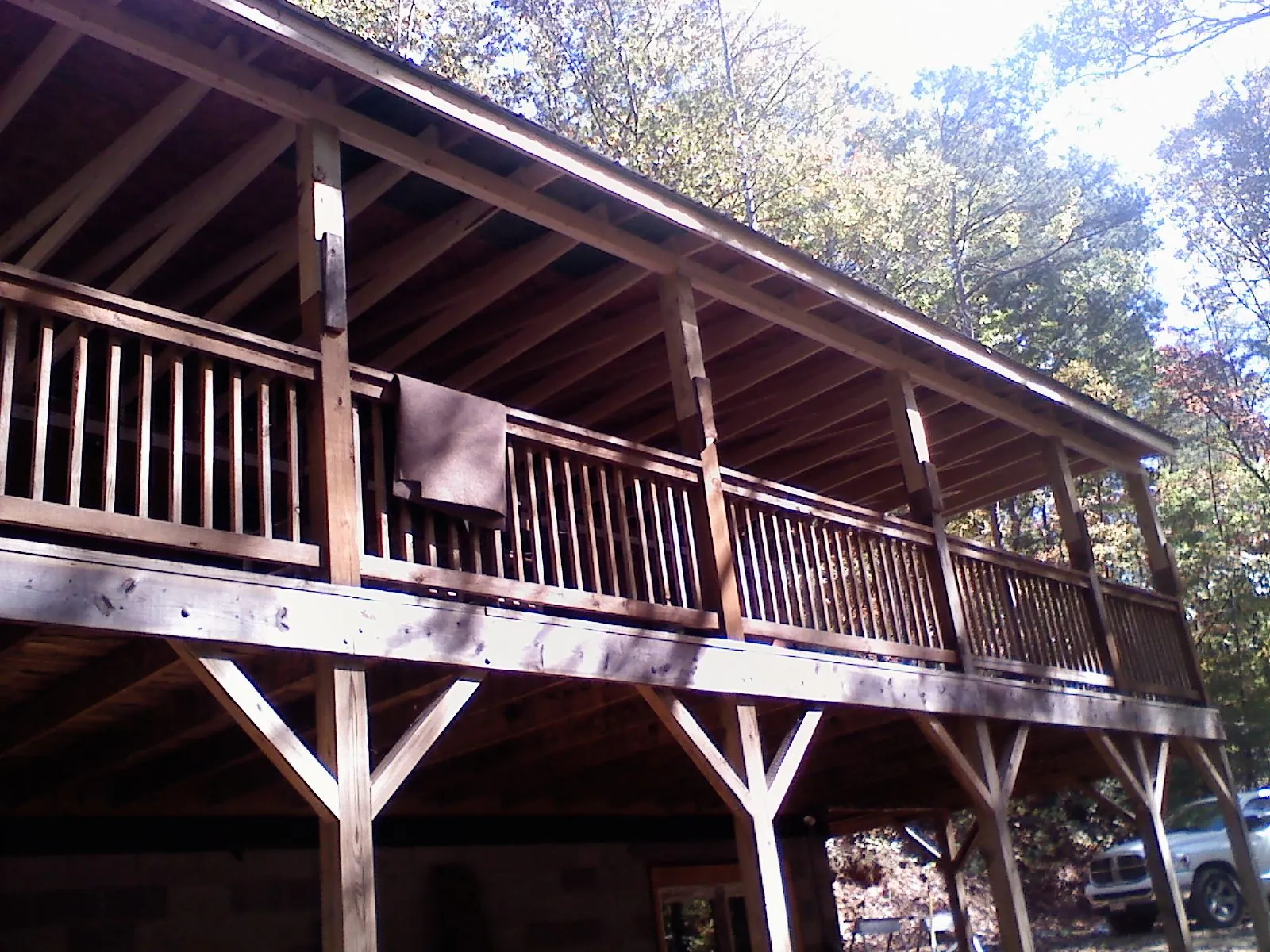 Timber framing under a new elevated porch and deck — Roof Leak Repair in Minneota by Roofing Brothers
